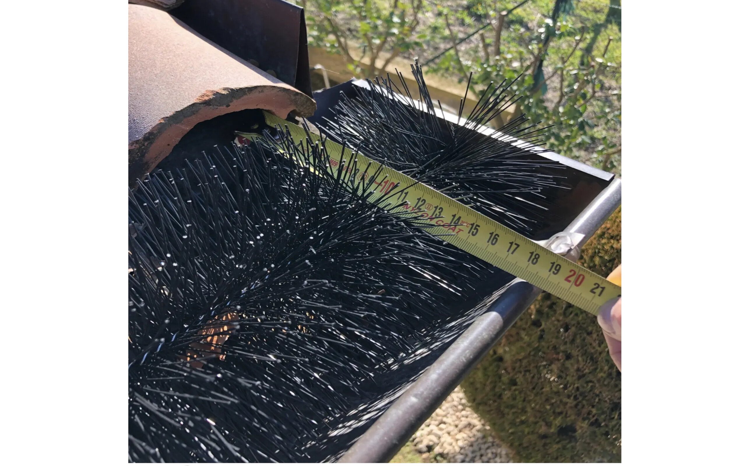 Scovolo per grondaia